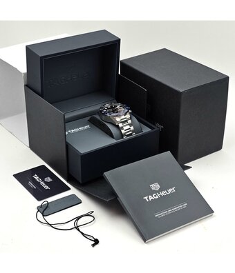 TAG Heuer Carrera Calibre Heuer 02 Chronograph GMT 45 steel skeleton black/blue bezel 2026 B+P