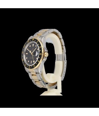 Rolex GMT-Master II 40 black 1994 | steel - yellow gold Oyster