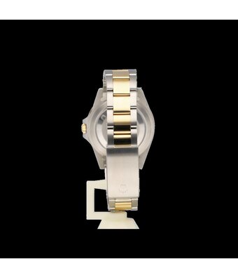 Rolex GMT-Master II 40 black 1994 | steel - yellow gold Oyster