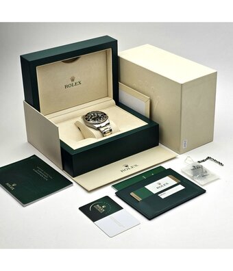 Rolex Submariner Date 40 steel - yellow gold black ceramic 2015 B+P
