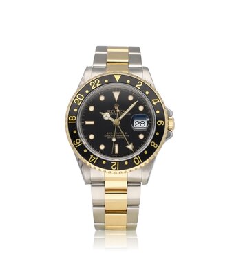Rolex GMT-Master II 40 black 1994 | steel - yellow gold Oyster