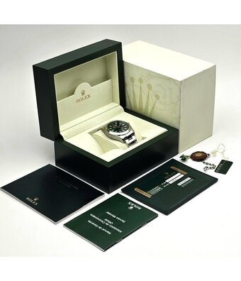 Rolex Milgauss 40 - 2013 box + papers | steel black orange - green - GV Oyster
