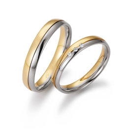 Gettmann Trouwringen - Wit en geel goud - 8386,35 mm - 3 briljanten = 0.024 ct