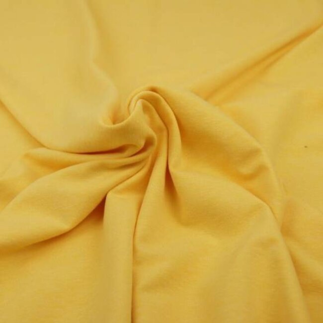 De Stoffenkamer Effen tricot warm geel