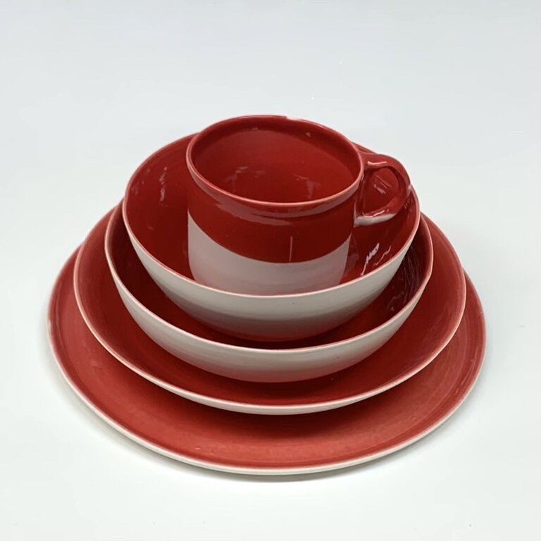 J.C. Herman Porcella Publica Dinerbord