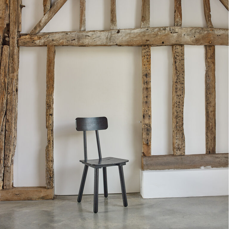 Another Country Another Chair black showroom model