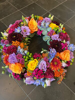 Rouwkrans felle bonte kleuren (ring 35cm)