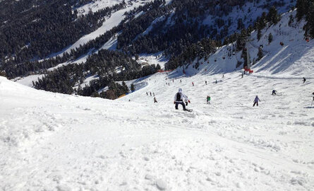 Wat is beter voor je knieën skiën of snowboarden?