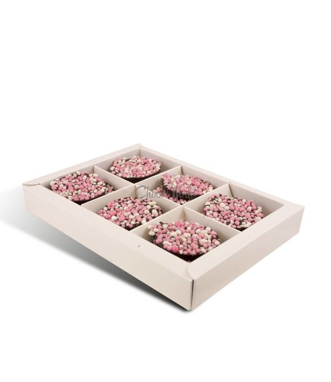 Chocolade geboorte flikken met roze muisjes