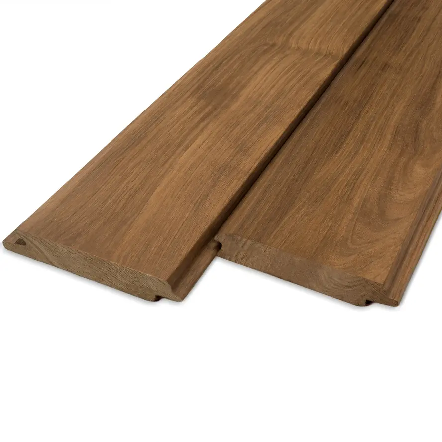 Thermo fraké vellingdeel (blinde bevestiging) - 21x120 mm - geschaafd - mes en groef plank - thermisch gemodificeerd frake hout KD 8-12% Thermo fraké vellingdeel (blinde bevestiging) - 21x120 mm - geschaafd - mes en groef plank - thermisch gemodificeerd frake hout KD 8-12%
