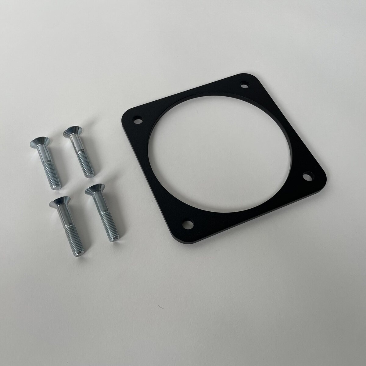 Plaque d'écartement pour module de fixation de roue de secours, pour jantes à grand déport