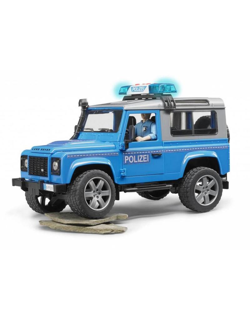 Bruder Bruder 2597 - Land Rover Defender Stationwagen - Politieauto en politie agent