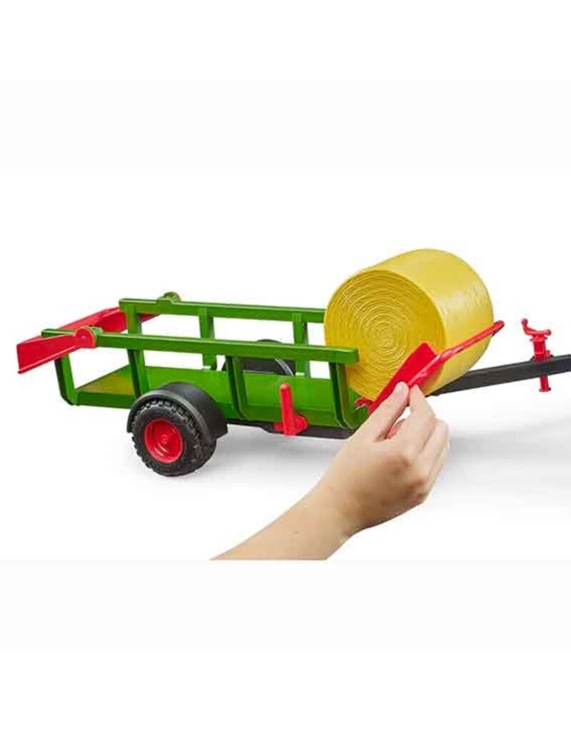 Bruder Bruder 2204 - Zelfladende balentrailer met 3 ronde hooibalen 1:16