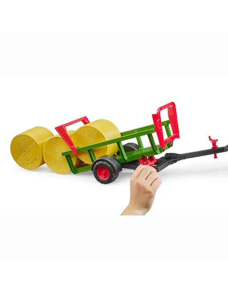 Bruder Bruder 2204 - Zelfladende balentrailer met 3 ronde hooibalen 1:16