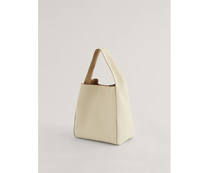 white and tan bag
