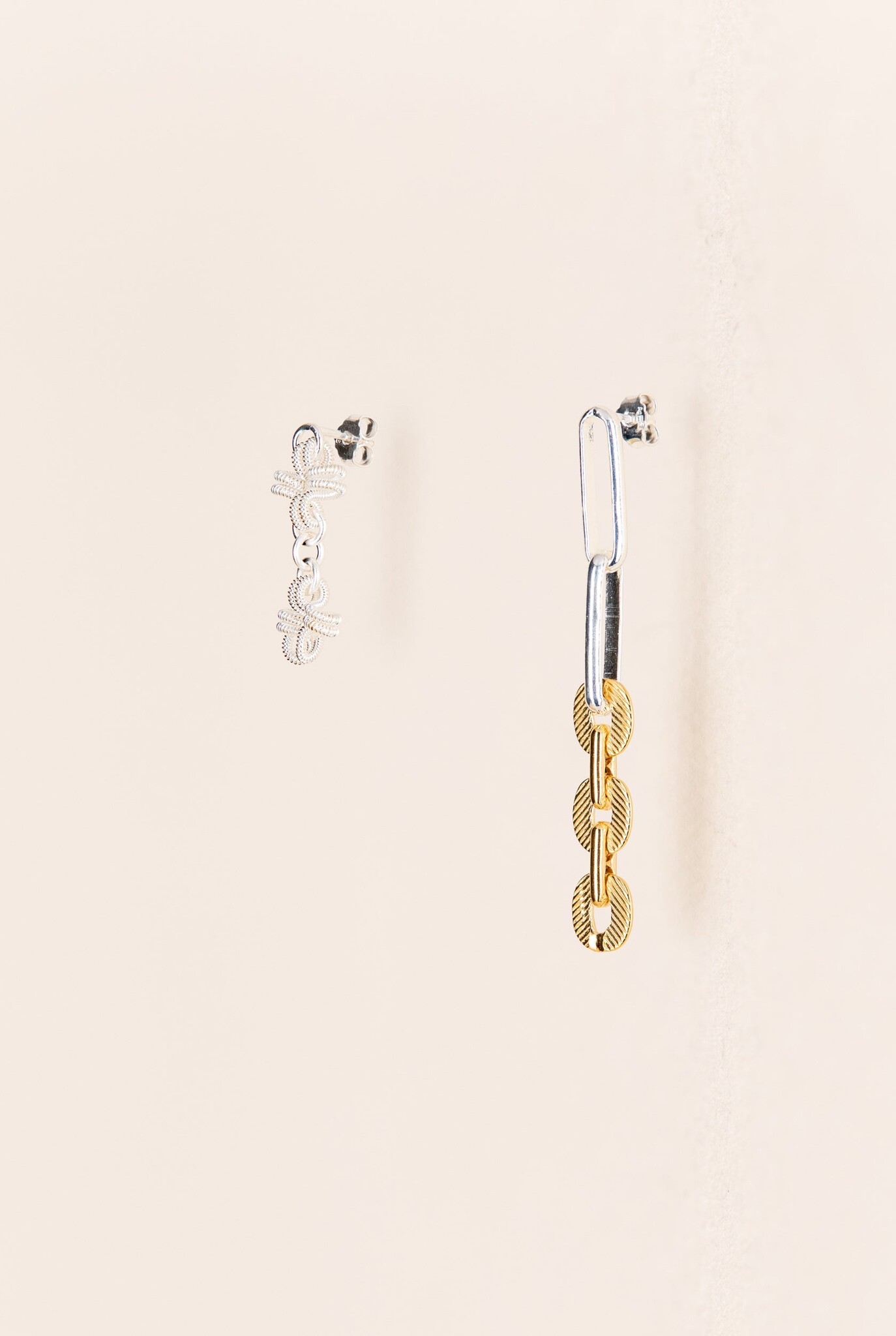 Asymmetric pendant post earrings with diverse chains in silver and gold-plated