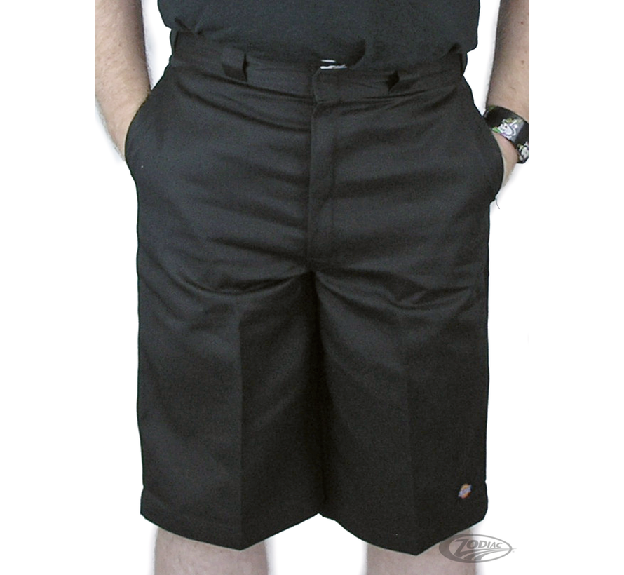 Genuine Dickies brand work shorts with a relaxed baggy fit. Has a flat front and multi-use side pocket. Permanent crease, never needs ironing. Scotchgard stain release finish. Dickies logo label on the left front leg and on the multi-use side pocket, as w