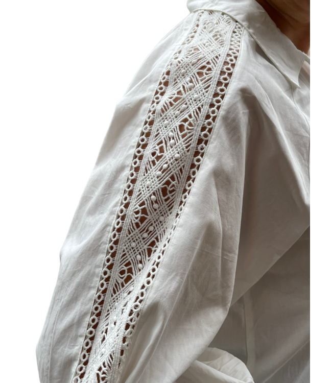 blouse met knopen en lang manchet