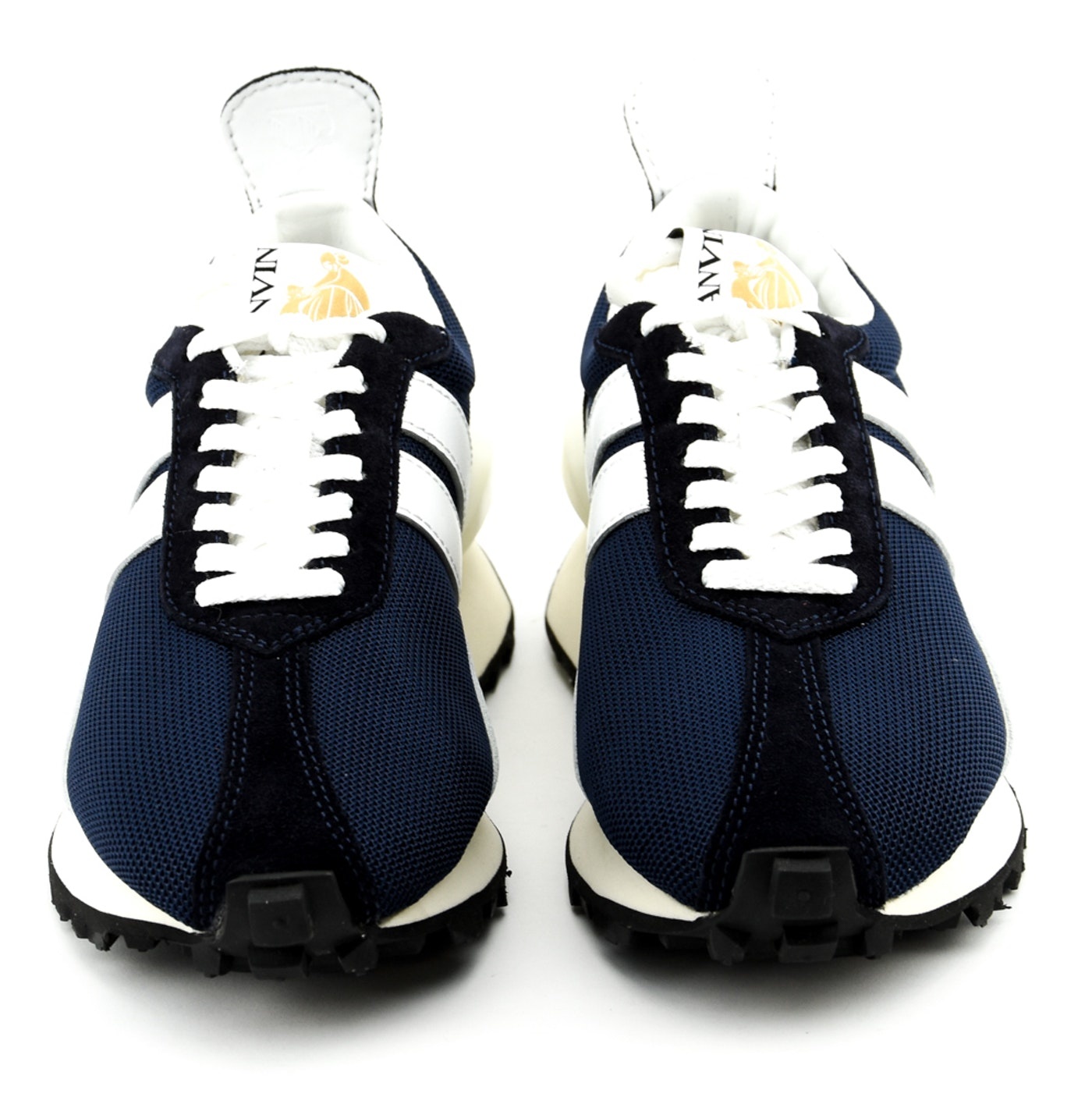navy and white tennis shoes