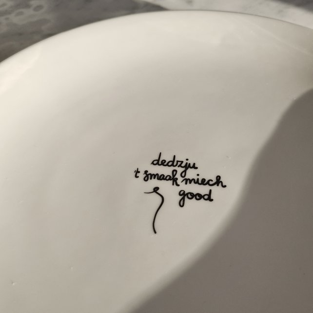 Bord 27cm "Dedzju 't smaak miech good" Bord 27cm "Dedzju 't smaak miech good"