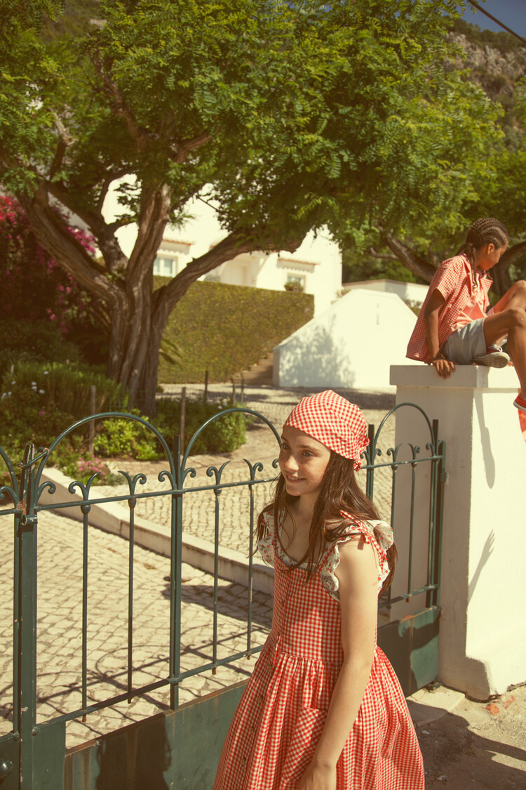 Piupiuchick sleeveless blouse | ecru w/ red flowers allover