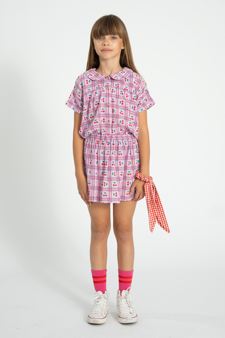 Piupiuchick short skirt | lilac w/ cherries allover