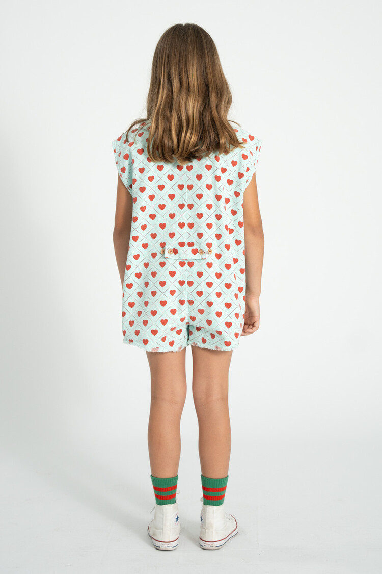 Piupiuchick short sleeveless jumpsuit | light blue w/ red hearts allover