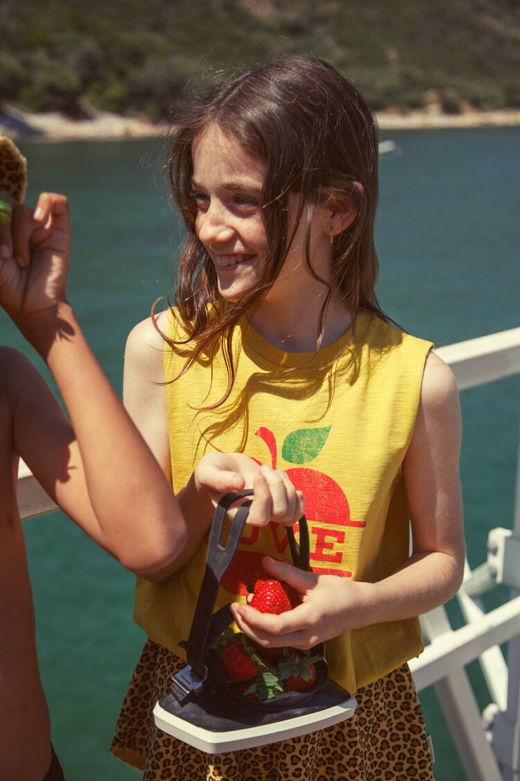 Piupiuchick sleeveless top | mustard w/ apple print