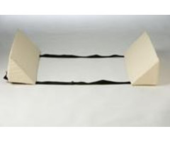 Wedges for lateral support in bed, connected with beige strips