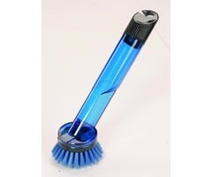 Dishwashing brush with detergent reservoir