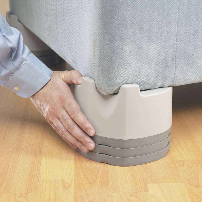 Linked furniture boosters adjustable in height