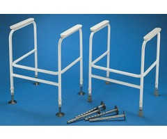 Toilet frame with floor mounting to prevent sliding