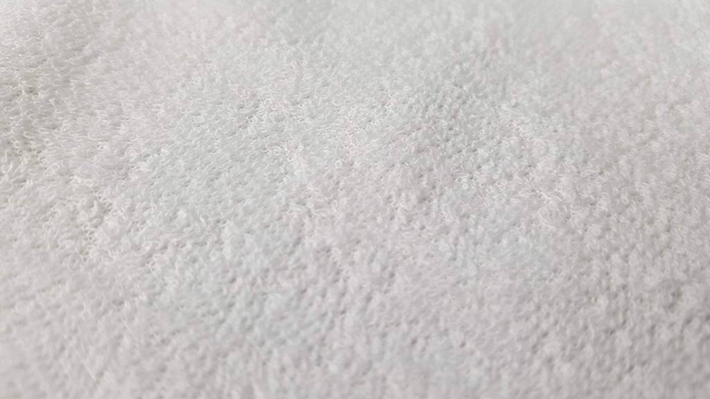 Bavoir en éponge avec une zone de ramassage XL