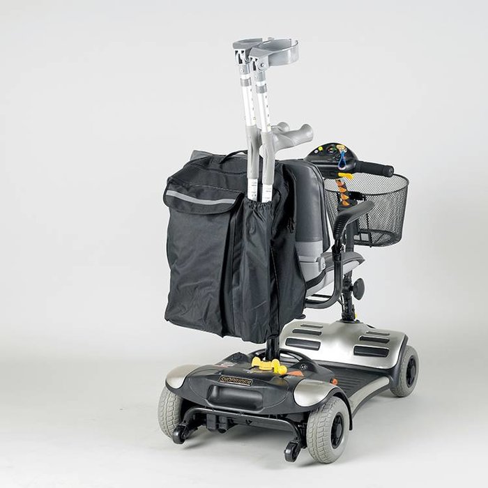 Storage bag for the back of the scooter or wheelchair with walking stick pocket
