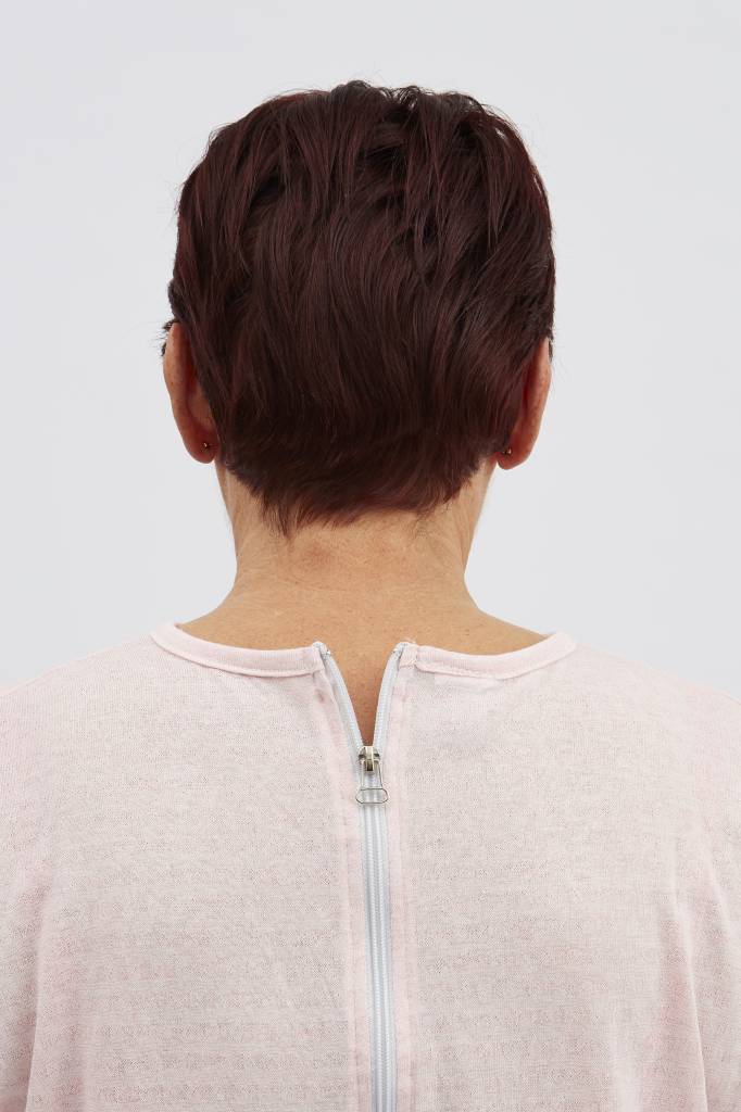 Roze pyjama met ritssluiting op de rug