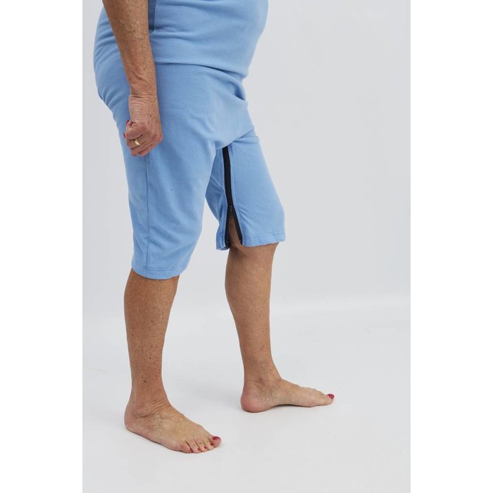 Light blue polo shirt with zipper between the legs