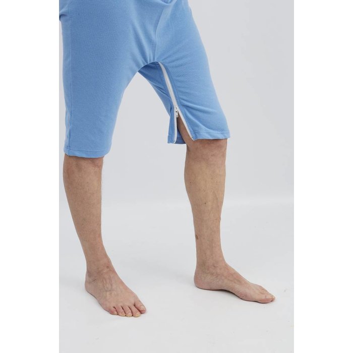 Light blue polo shirt with zipper between the legs