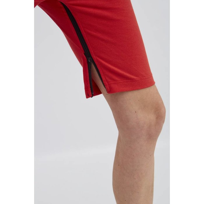 Red polo with zipper between the legs