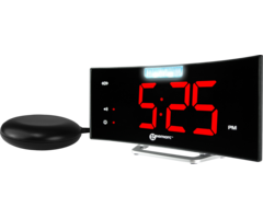 Alarm clock with vibrating accessory under pillow