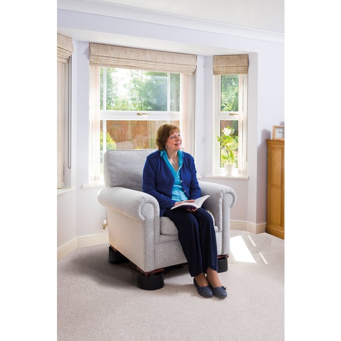 Linked furniture boosters adjustable in height