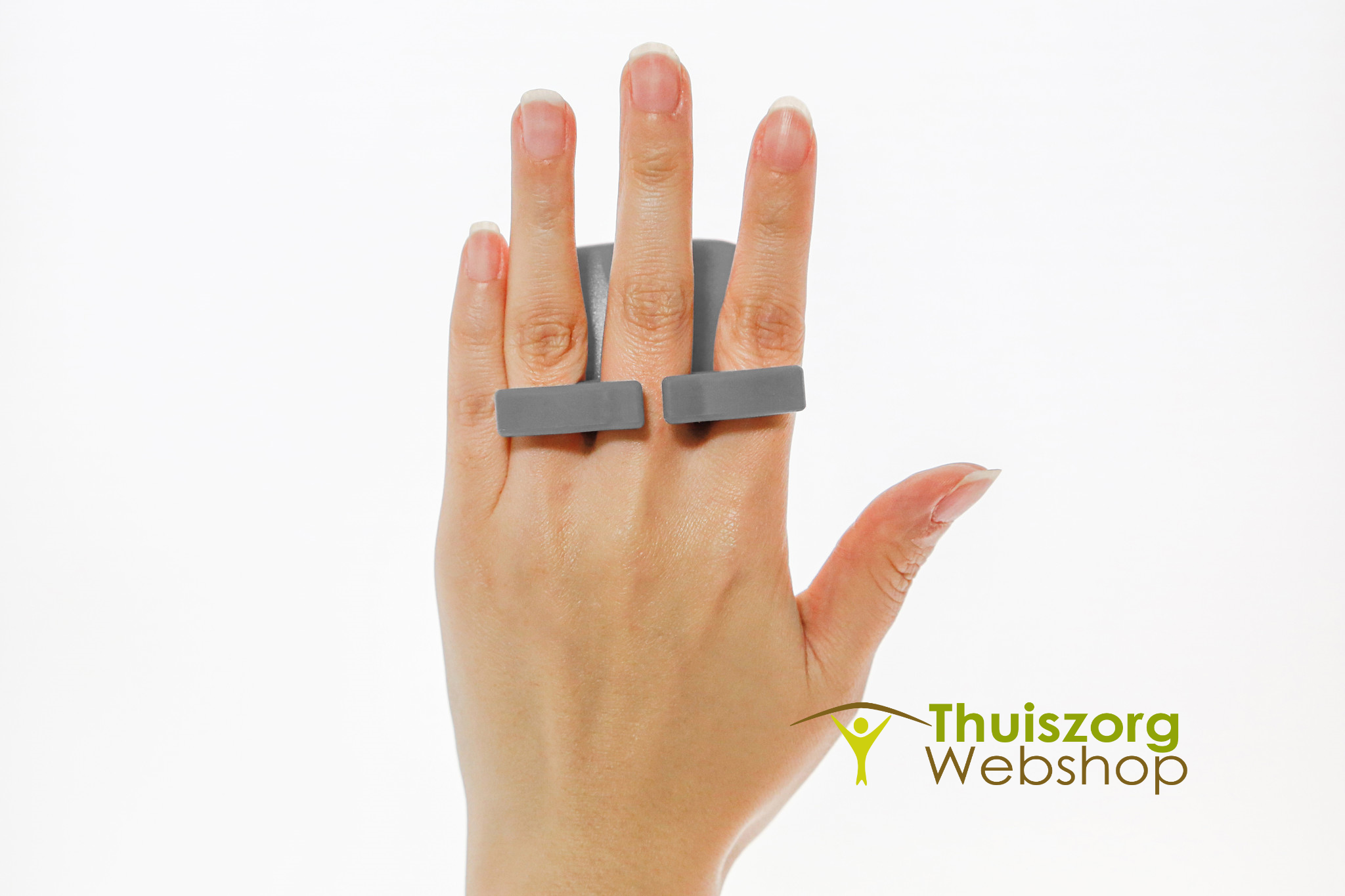 Ergonomic finger-grip peeler with straight or serrated cutting blades