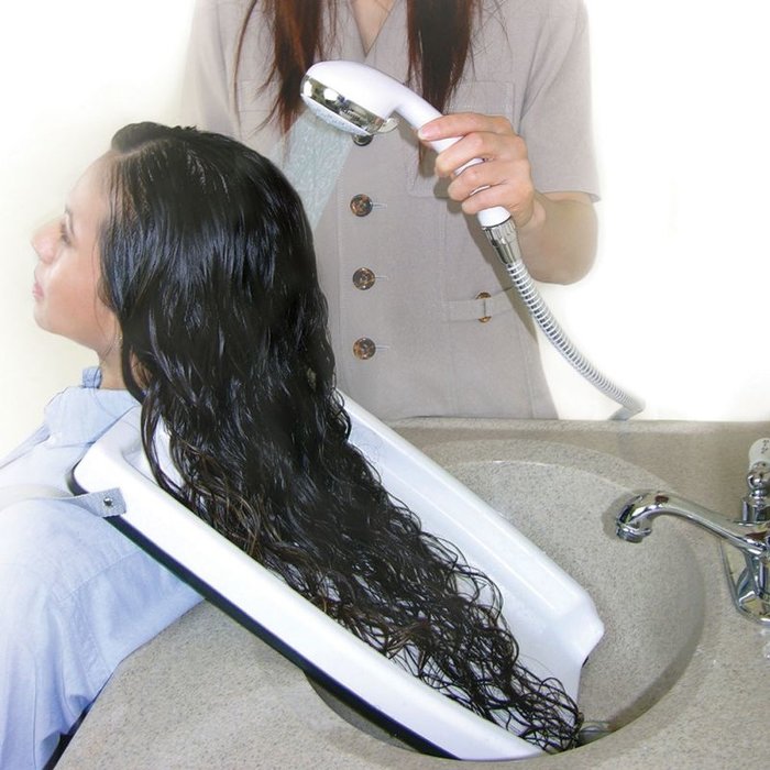 Hair wash basin with flexible rubber edge with straps