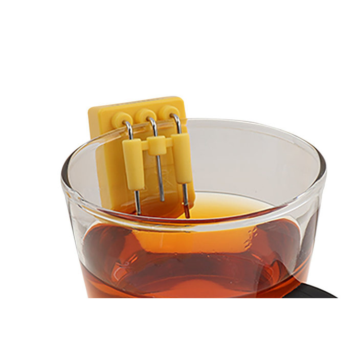 Indicateur de liquide suspendu au bord d'une tasse ou d'un verre