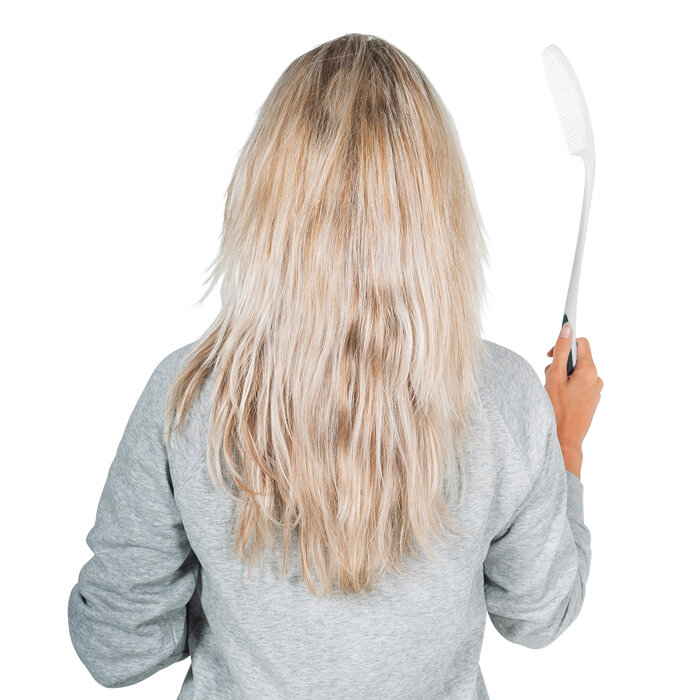 Brush or comb with extended handle