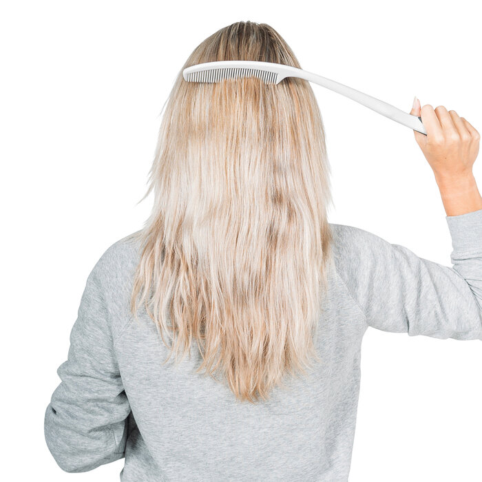 Brush or comb with extended handle