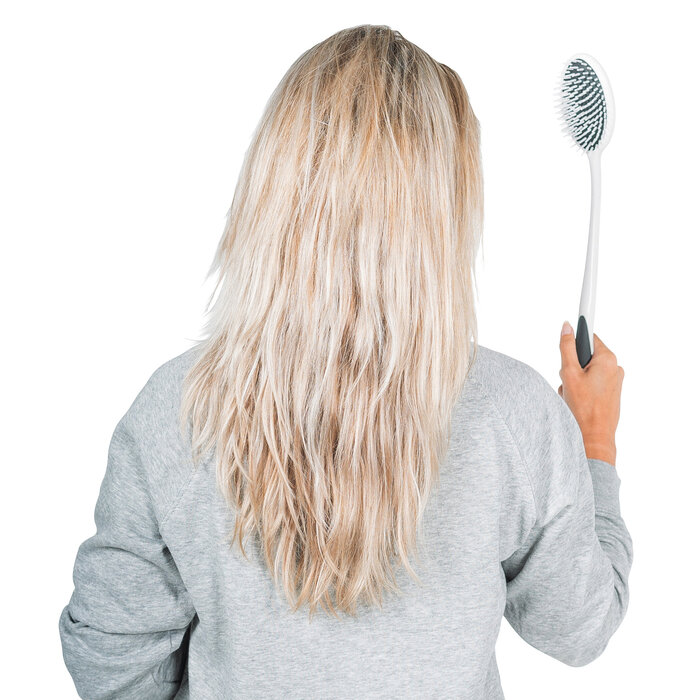 Brush or comb with extended handle