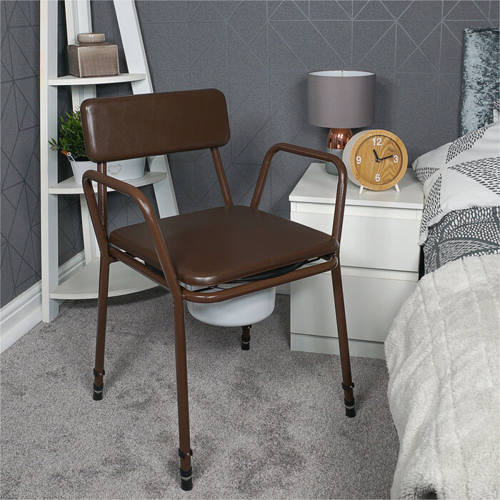 Freestanding, height-adjustable stackable commode chair with padded backrest and top seat.