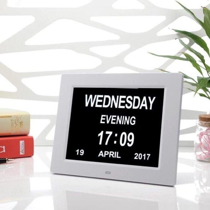Digital calendar clock with 12 alarms and remote control