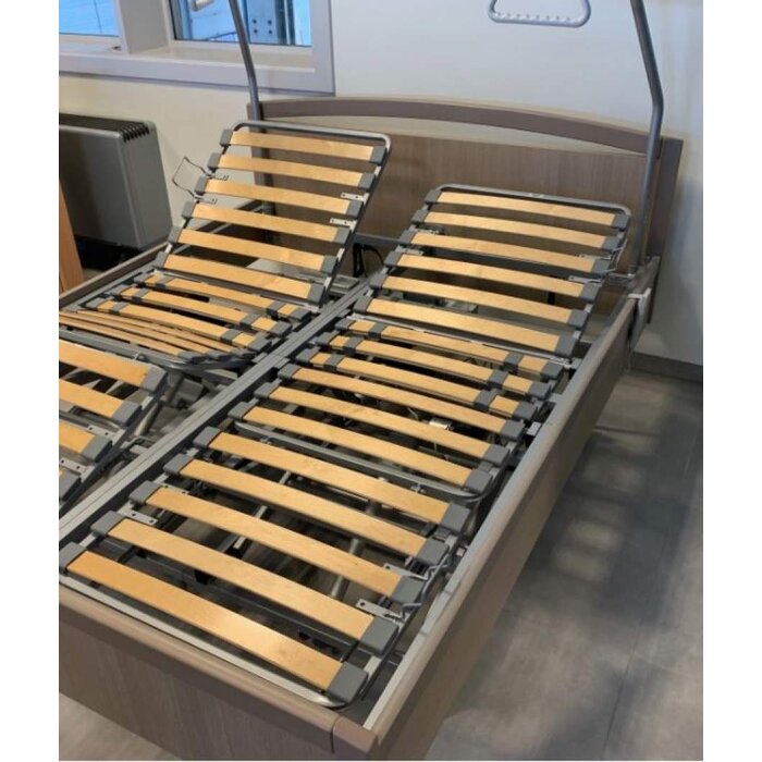 Electrically height-adjustable box double bed