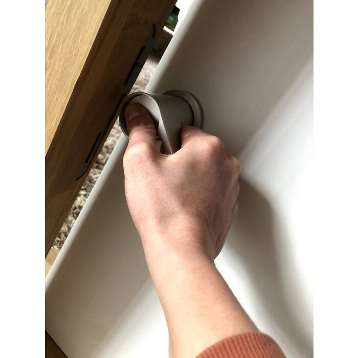 Poignée de porte combinée pour personnes ayant un comportement errant